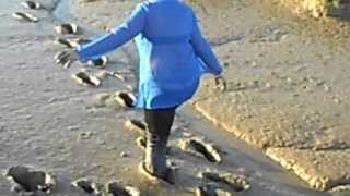 Muddy boots and legs
