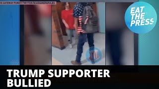 Watch: young Trump supporter spit on at school