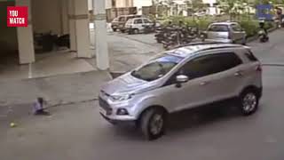 A small child trampled by a car on his head but miraculously survives.