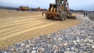 Cat 140h greyder