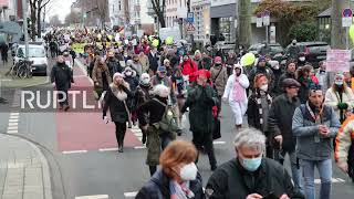 Germany: Protesters march through Dusseldorf against COVID restrix, vaccine mandate
