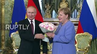 Russia: Putin and Merkel hold bilateral talks