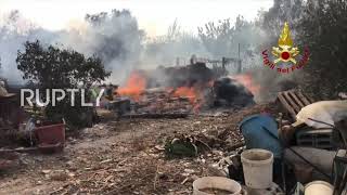 Italy: Firefighters battle Sardinian wildfires