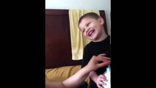 Cute little boy laughing