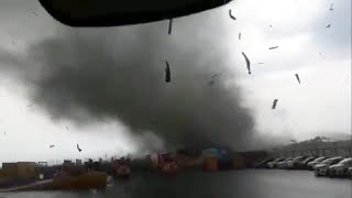The Tornado destroyed buildings and blew off roofs! Eyewitnesses filmed from several meters!
