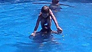 Mom balances Carson on her shoulders