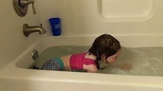 Mermaid swimming in the bathtub
