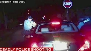Officer: 'We've got a gun in his glove compartm...