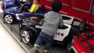 Kid Test Drives Toy Cars