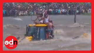 Helicopter Miraculously RESCUES Man From Sinking Tractor