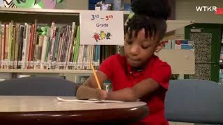 Girl with no hands wins handwriting contest