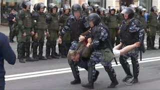 Putin rival arrested as anti-corruption protests sweep Russia