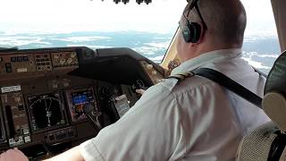 B 747 cargo LAND in OSLO AIRPORT.    Clear day  (cockpit view)