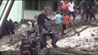 Raw: Building Collapses, Dozens Feared Trapped