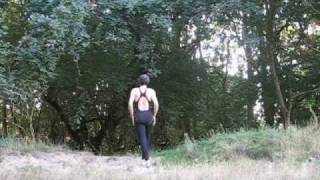 Outdoor crossdresser stretching