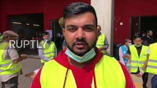 Germany: Muslim youth organisation volunteers provide aid to flood victims in Nurburg