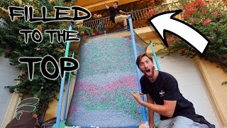 TRAMPOLINE FILLED WITH STYROFOAM PEANUTS (COMPLETELY FULL)