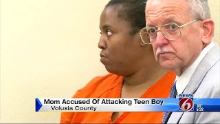 Mom accused of attacking teen boy