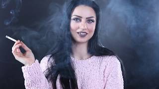 Black hair, grey eyes, and a cork cigarette smoked with style - smoking fetish
