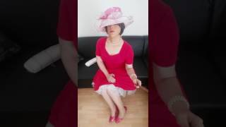 elegant crossdresser lady Christina d´Yvon shows off her petticoat dress and hat for the races.