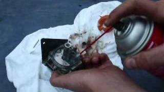 How to clean and put back on a briggs and stratton carb part 1