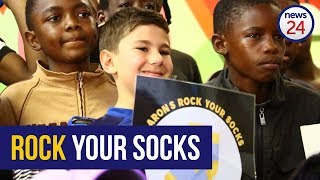 WATCH: Nine year old collects thousands of socks for charity this winter