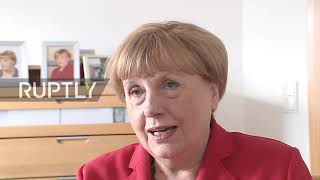 Famous Merkel doppelganger prepares to retire, as real chancellor"s time in office winds down