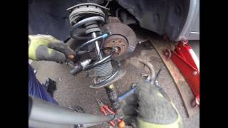 How to change the front spring rack Renault Megane / Как поменять передний пружину стойку  Megane