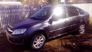 Установка подлокотника Аламар в Лада Гранта Liftback