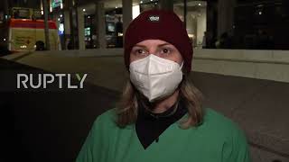 Germany: Medical workers flood Karlsruhe street to encourage vaccinations