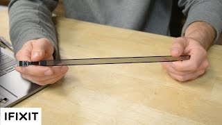 Inside Apple's New MacBook Pro TouchBar (and Touch ID!)
