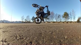 moped / scooter WHEELIES and SNOW DRIFTING
