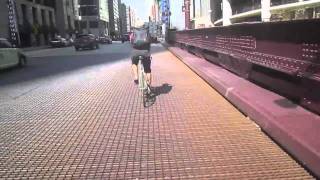 Sammy riding fixie through Chicago