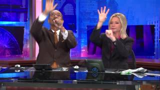 WGN-TV Anchors Robert Jordan and Jackie Bange`s commercial break handshake