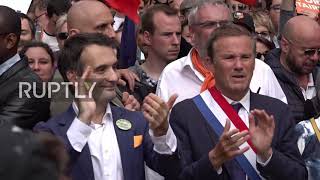 France: Pres candidate Philippot leads Paris march against tightening of COVID-19 restrix