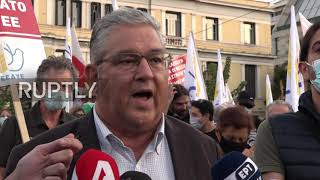 Greece: Protesters burn NATO and US flags near American embassy in Athens