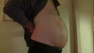 Fat belly in a tight shirt