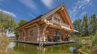 Naturstammhaus TV - Blockhaus in Luzern
