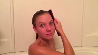 @trinamason brushing hair in bath tub