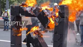 Germany: Activists set 'Deutsche Bank logo' on fire amid mass climate rally in Frankfurt