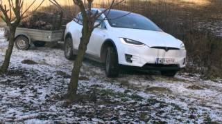 Tesla Model X offroad with trailer
