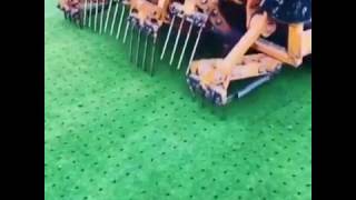 Машина для аэрации поля для гольфа / The machine for aerating golf course