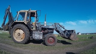 Трактор Беларусь копает траншею под фундамент (timelapse)