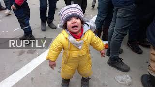 Belarus: Stranded migrants raise white flag on border with Poland