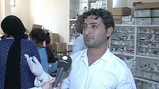 Syrian refugees treated in Turkish makeshift clinics
