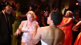 Lady motorboats the bride on the dance floor