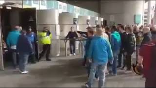 Millwall fans trying to break into the Bradford end!