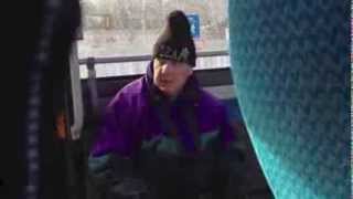 Old man rapping on bus