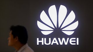 The Point: Does Chinese law require companies to spy for Beijing?