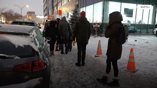 Long queues outside vaccination sites ahead of restrictions at liquor and cannabis stores in Quebec